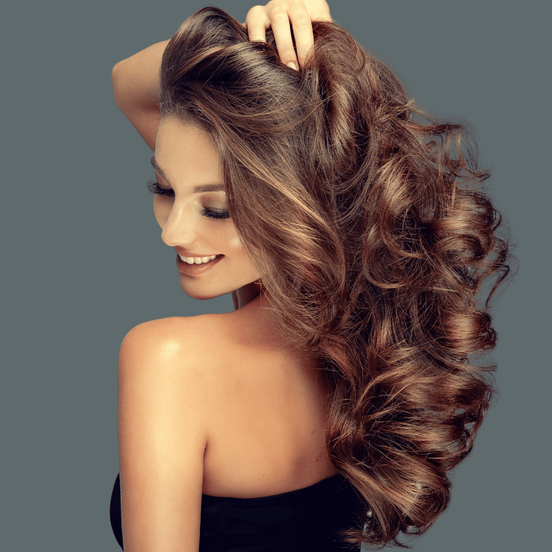 woman touching her hair